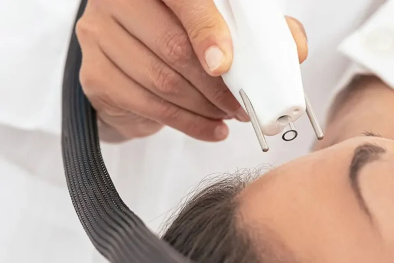 Woman getting Agejet plasma rejuvenation treatment in Bismarck, ND | Embrace Wellness