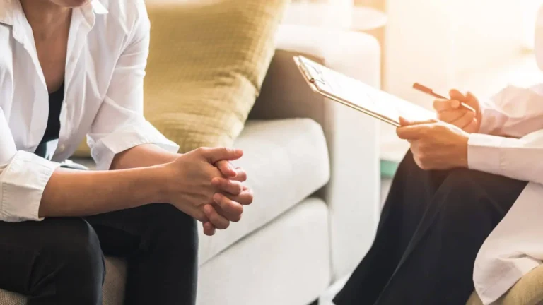 Nurse and patient doing consultaton before therapy in Bismarck, ND | Embrace Wellness