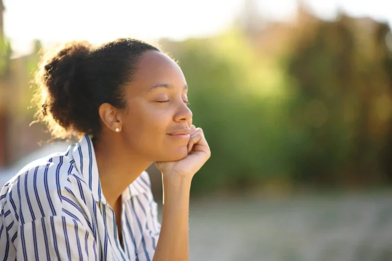 Lady with closed eyes and smily face relaxing after formav treatment in bismarck, ND | Embrace Wellness