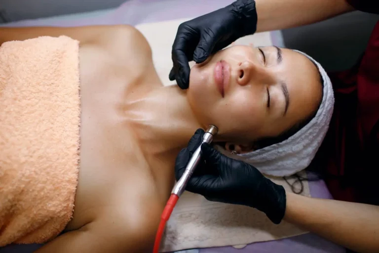 Woman receiving Hydrfacial procedure at Embrace Wellness in Bismarck, ND