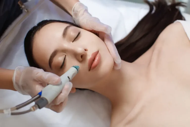 Lady getting hydrafacial treatment at Embrace Wellness in Bismarck, ND