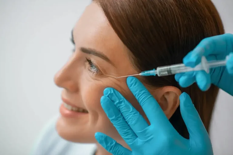 Woman getting neuromodulators injection by nurse at Embrace Wellness Clinic in Bismarck, ND