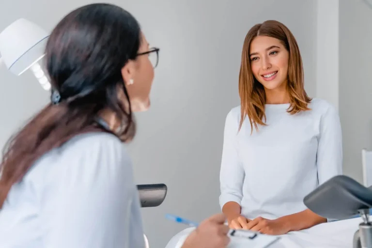 Woman taking consultation for V tone treatment in Bismarck, ND