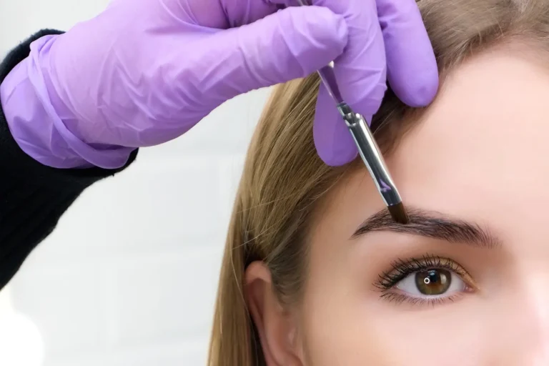 Lady getting Eyebrow Services in Bismarck, ND at Embrace Wellness