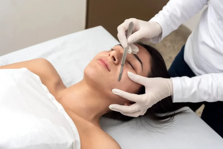 Woman receiving Dermaplane treatment at Embrace Wellness in Bismarck, ND