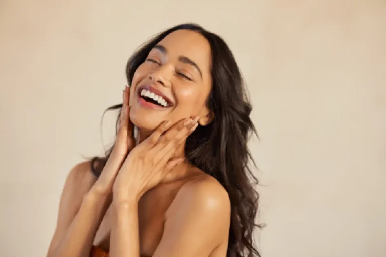 Woman Smiling after Skin Treatment in Bismarck, ND | Embrace Wellness