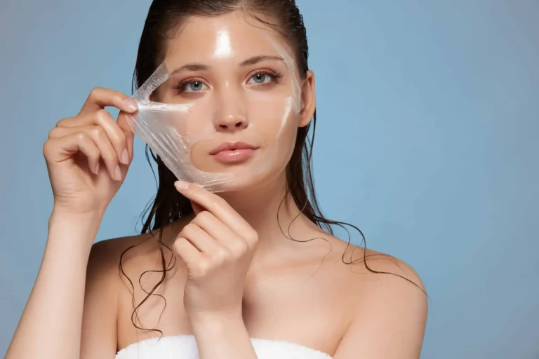 Lady removing peel after chemical peel treatment in Bismarck, ND