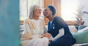 Healthcare professional providing supportive care to a patient during recovery